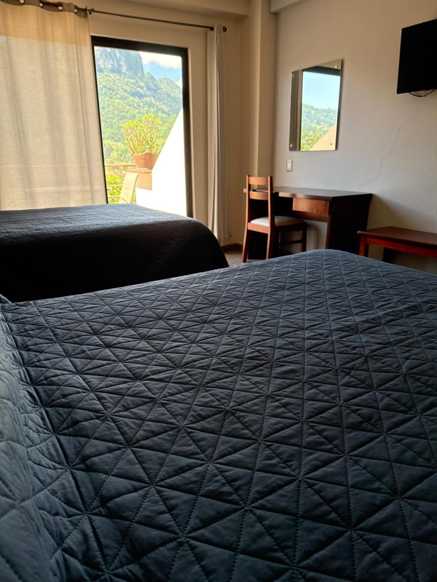 Hotel Suites Don Miguel Tlatlauquitepec ภายนอก รูปภาพ